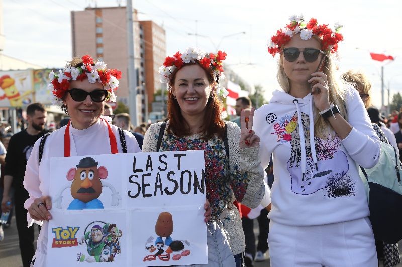 Women with a wreath on their heads pose for a photo during a Belarusian opposition supporters' rally protesting the official presidential election results in Minsk, Belarus. (Photo by TUT.by via AP Photo)